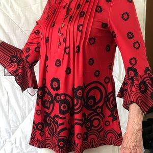 Red dress with flare three-quarter sleeves